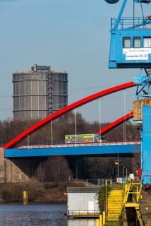 Gasometer of the Prosperität coking plant in Bottrop, cranes in Essen city harbour, motorway bridge