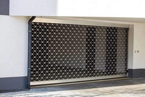 Roller shutter door at the entrance to the underground car park of a residential complex