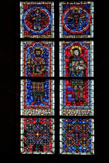 Colourful stained glass window with apostle John and Matthew, evangelist, two, figures, biblical,