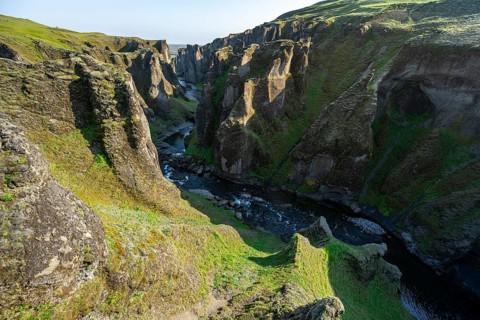 Fjaðrárgljúfur Canyon, Fjadrargljufur, rock formations in rugged deep canyon with river in the