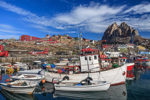 Harbour with boats and houses, Inuit settlement, Heart Mountain, summer, sunny, Uummannaq, West