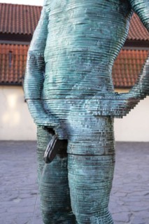 Two male figures peeing, sculpture by the artist David Cerny in front of the Franz Kafka Museum,