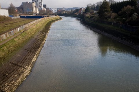 Concrete revetments reinforcing river banks to increase channel efficiency, River Gipping, Ipswich,