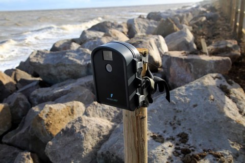 Wingscapes time lapse digital camera mounted on a post at Bawdsey, Suffolk, England, UK