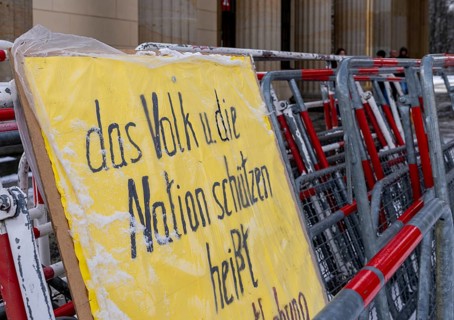 Demonstration, posters and barriers at the Brandenburg Gate, Berlin, Germany, Europe