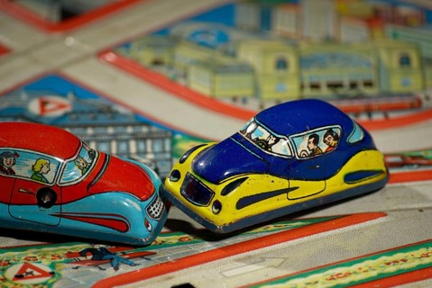 Road traffic, automobile, collision at crossroads, shown with model cars made of sheet metal