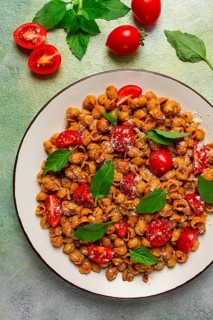 Tuscan pasta with smoked paprika and basil, parmesan cheese, Italian traditional cuisine