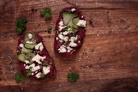Sandwiches with beetroot hummus, cucumber and blue cheese, microgreens, rye bread, breakfast,