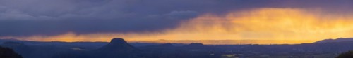 View from the Carolafelsen over Pirna to Dresden. Sunset and rain showers, Bad Schandau, Saxony,