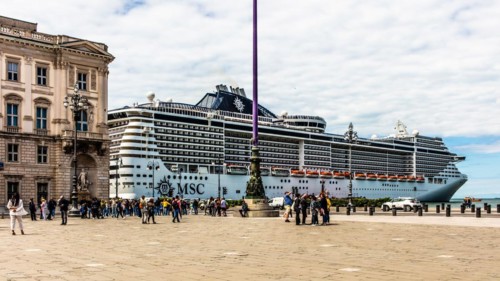 Piazza Unità d'Italia borders directly on the sea with cruise ships, Trieste, harbour city on the
