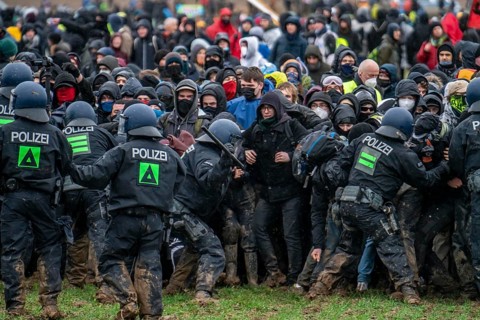 Violent clashes between thousands of demonstrators and the police, after a demonstration against