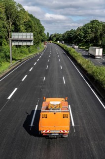 Marking work after the renewal of the road surface on the A40 motorway between the Kaiserberg