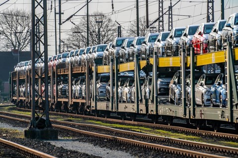 VW plant, Emden, new cars, car transporter, car train, goods train, with VW vehicles, Lower Saxony,
