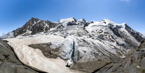 High alpine glaciated mountain landscape, La Jonction, Glacier des Bossons meets Glacier de