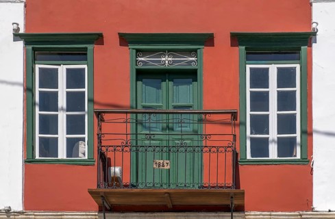 House facade with balcony, Symi Island, Dodecanese, Greek Islands, Greece, Europe