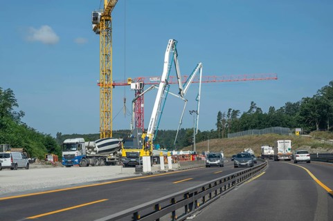Construction cranes at a building site on the A6 motorway, Bavaria, Germany, Europe