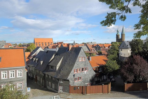 View of houses with slate roof and market church, Goslar, Harz, Lower Saxony, Germany, Europe