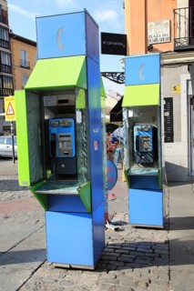 Telephone kiosk boxes in street, La Latina, Madrid city centre, Spain, Europe