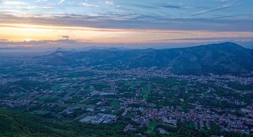 View of the densely populated Neapolitan region and the mountains near Caserta at dusk. San Felice