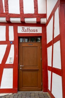 Entrance to the town hall, in the four-gabled house, Monreal, idyllic half-timbered town in the Elz