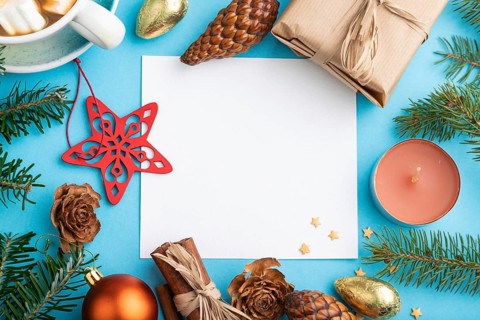 Christmas or New Year composition, template. Decorations, box, cinnamon, cones, fir and spruce