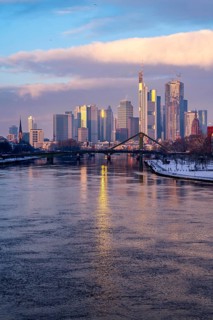 The skyline of Frankfurt am Main, skyscrapers of the banking district, Flößerbrücke, wintry