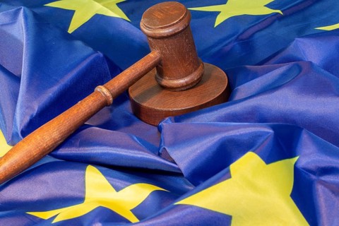 Symbolic image: Judge's gavel on a flag of the European Union