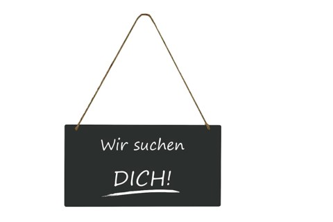 Freestanding sign with the inscription We are looking for you