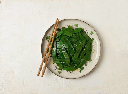 Salad of young peas, in pods, with sesame seeds, asian cuisine, homemade
