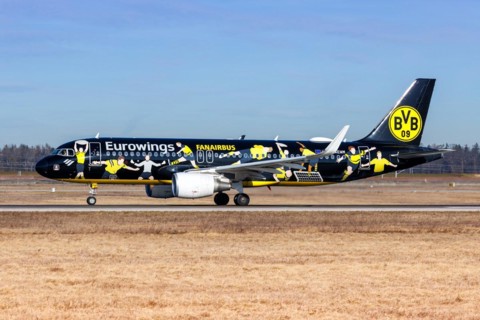 A Eurowings Airbus A320 aircraft with the registration D-AEWM and the Borussia Dortmund special