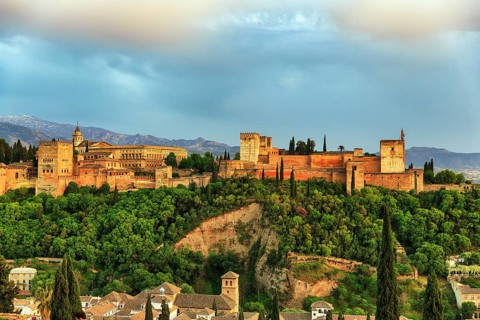 Alhambra on the Sabikah hill at sunset, Moorish city castle, Nasrid palaces, Sierra Nevada with
