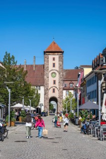 Pedestrian zone, shopping street with the Obertor, historic town gate of Villingen,