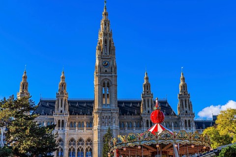 Children's carousel at the Christmas market at the town hall, behind the town hall, Vienna,