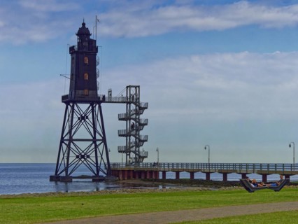 The Obereversand lighthouse, the former Eversand rear light, stands on the Wadden Sea in