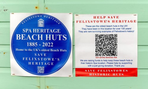 Information campaign posters to save spa heritage historic beach huts, Felixstowe, Suffolk,