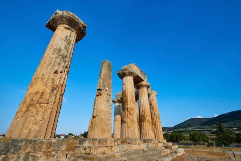 Archaic Temple of Apollo, Doric Columns, Historic columns against a picturesque backdrop of nature