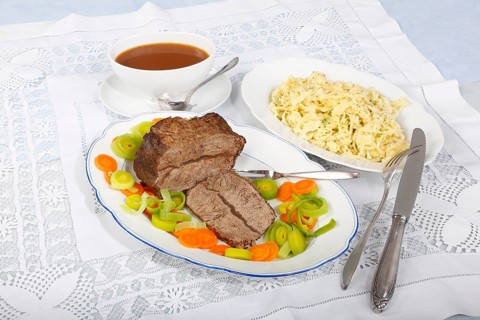 Swabian cuisine, roast beef, roast ox, herb spaetzle, meat dish, gravy, carrot vegetables, leek,