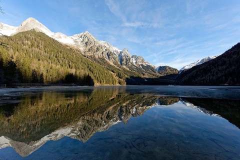 Winter on an icy lake, Lake Antholz in the Antholz Valley, Val Pusteria, South Tyrol, Italy, Europe