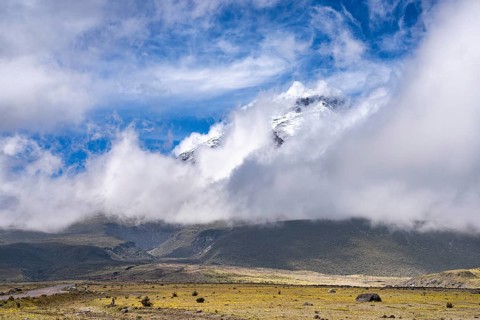 Cloud-shrouded Cotopaxi volcano, Cotopaxi, Cotopaxi National Park, Latacunga, Ecuador, South