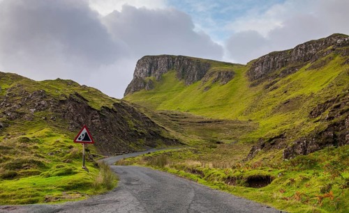 Empty mountain road at the picturesque and famous Quiraing mountain range at Trotternish area in