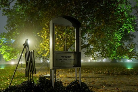 Dresden's old town shrouded in November fog. Brühl's Garden. Caspar David Friedrich monument by
