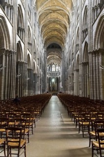 Rouen, France, August 30, 2018: Interior of a catholic temple. Central nave of the Notre-Dame de