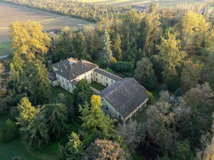 Aerial view of the sant'agata villa, the house of giuseppe verdi, surrounded by colorful autumn