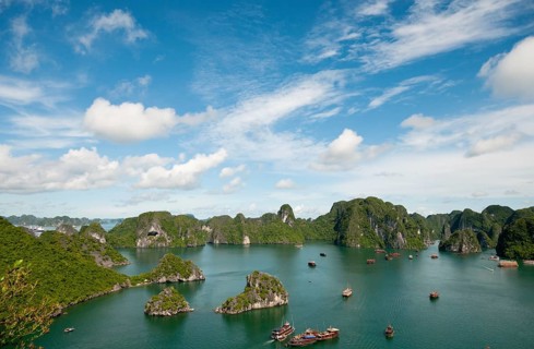 Cruise tourist boats at Halong bay in Vietnam. Halong bay is made of 3000 limestone islands