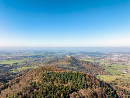 Aerial view from the Albtrauf over a mixed forest on the 956 metre high Raichberg to the Zeugenberg