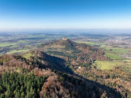 Aerial view from the Albtrauf over a mixed forest on the 956 metre high Raichberg to the Zeugenberg