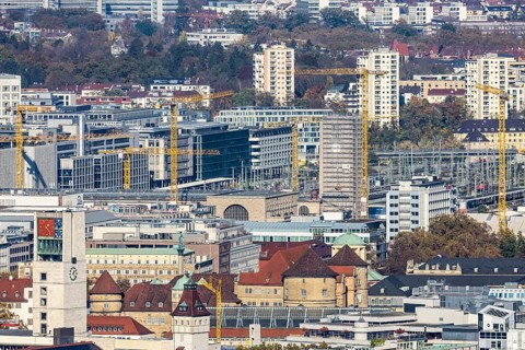 Central station with construction site Stuttgart 21, city centre with collegiate church, town hall