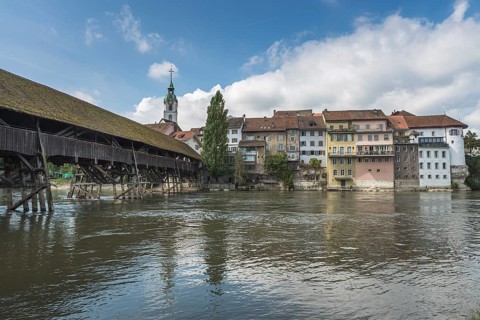 View of the River Aare and the old town of Olten with historic wooden bridge, Canton of Solothurn,