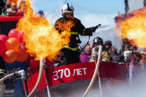 KAMCHATKA PENINSULA, RUSSIA, APR 27, 2019: Rescue firefighter Emercom of Russia flying with