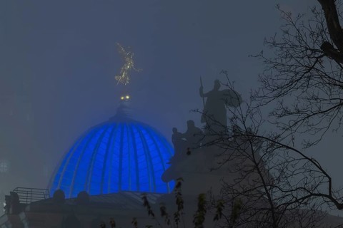 The old town of Dresden shrouded in November fog. Octagon dome with Fama and pediment figures of